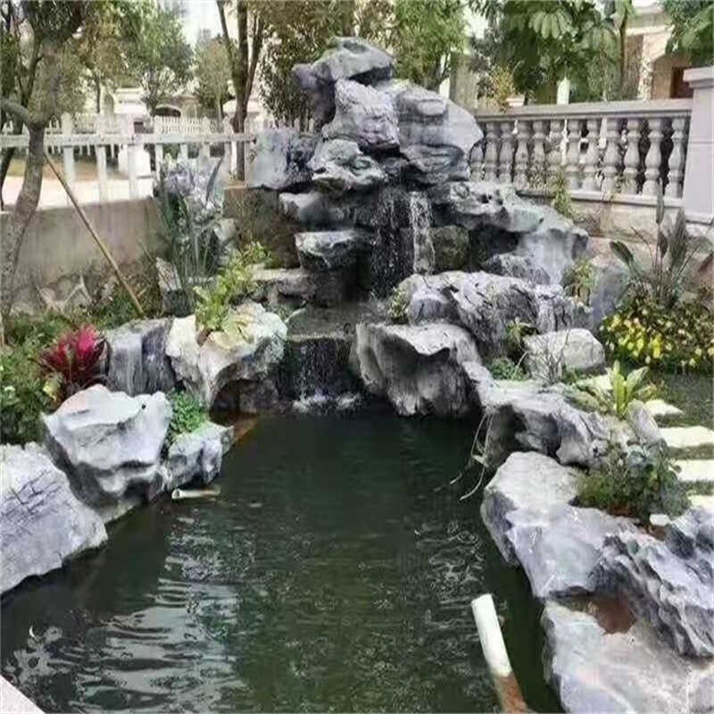 云南庭院鱼池假山图片